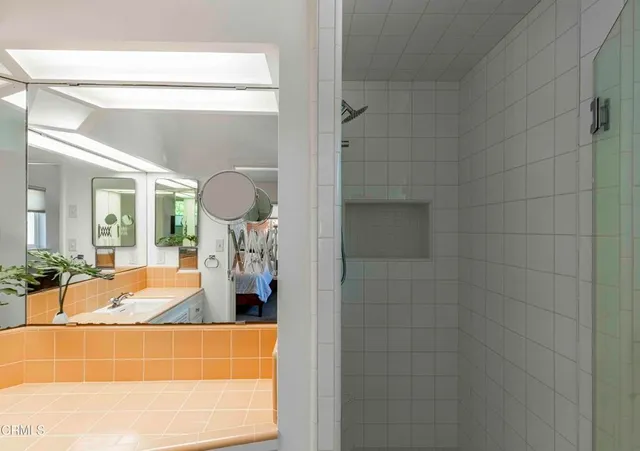 a view of a patio with table and chairs