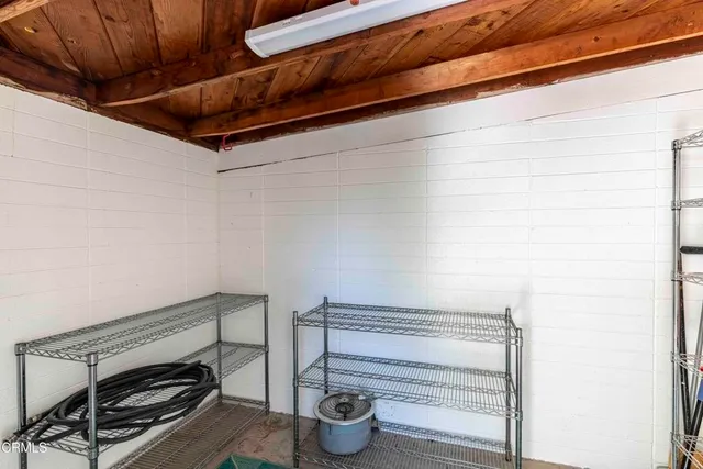 a view of a backyard with sitting area