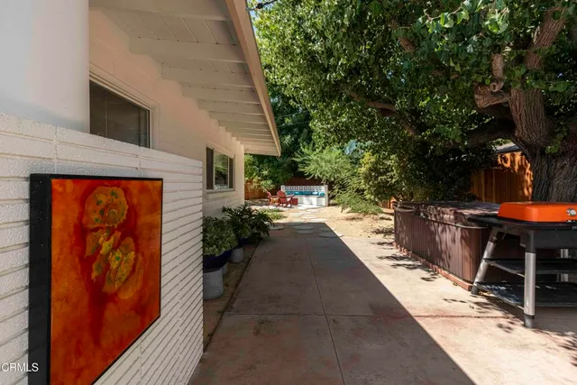 a view of a back yard of the house