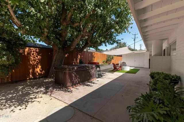 a utility room with cabinets and appliances