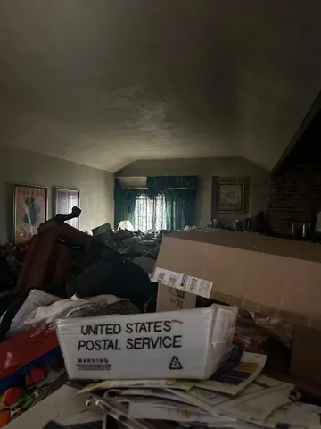a room with furniture and a flat screen tv