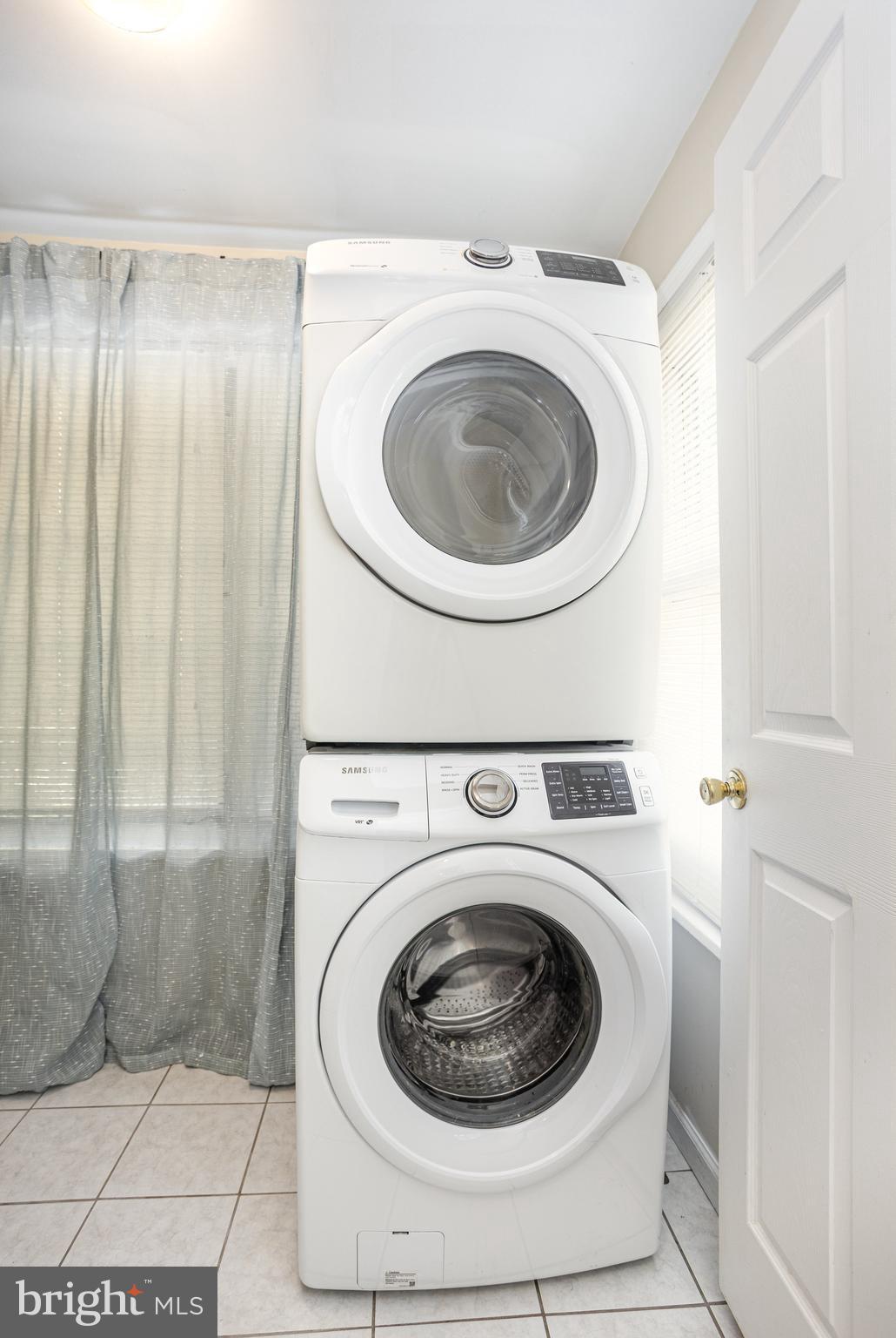 505 47th Street Baltimore, MD 21224 - Photo 25 of 41 a utility room with dryer and washer