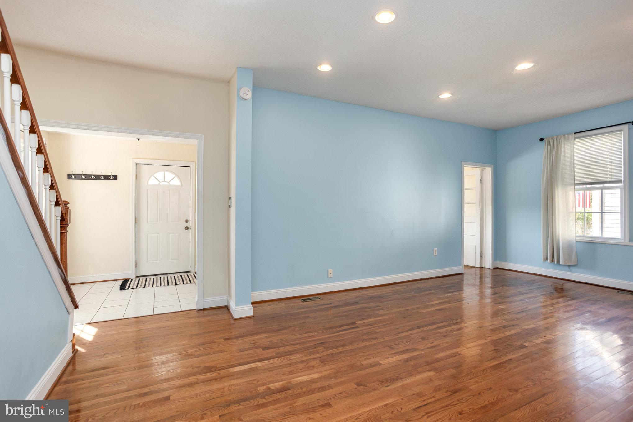 505 47th Street Baltimore, MD 21224 - Photo 7 of 41 wooden floor in an empty room with a window