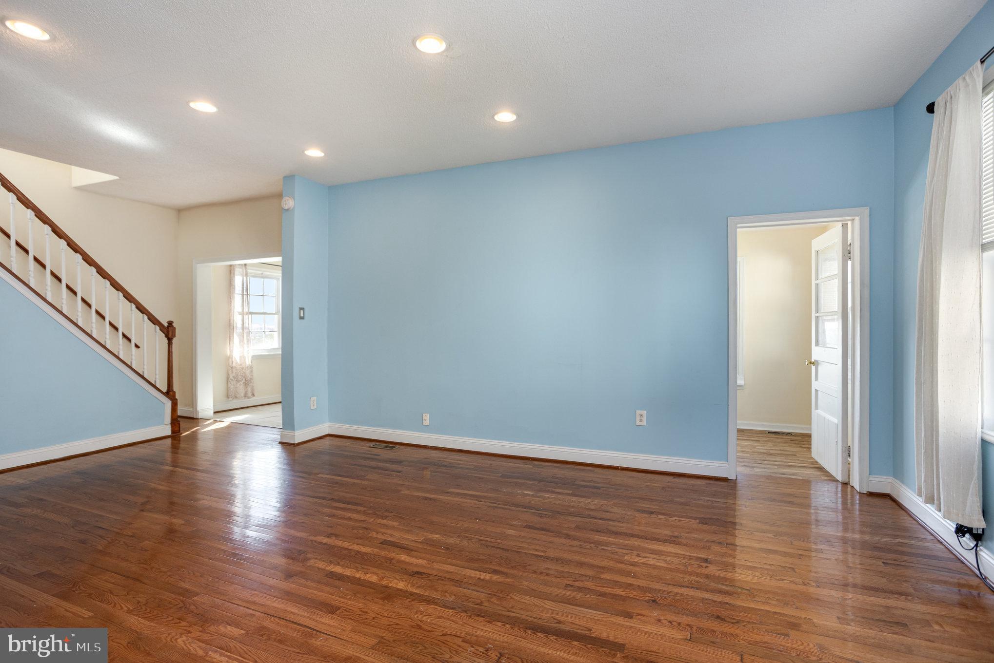 505 47th Street Baltimore, MD 21224 - Photo 9 of 41 a view of an empty room with wooden floor