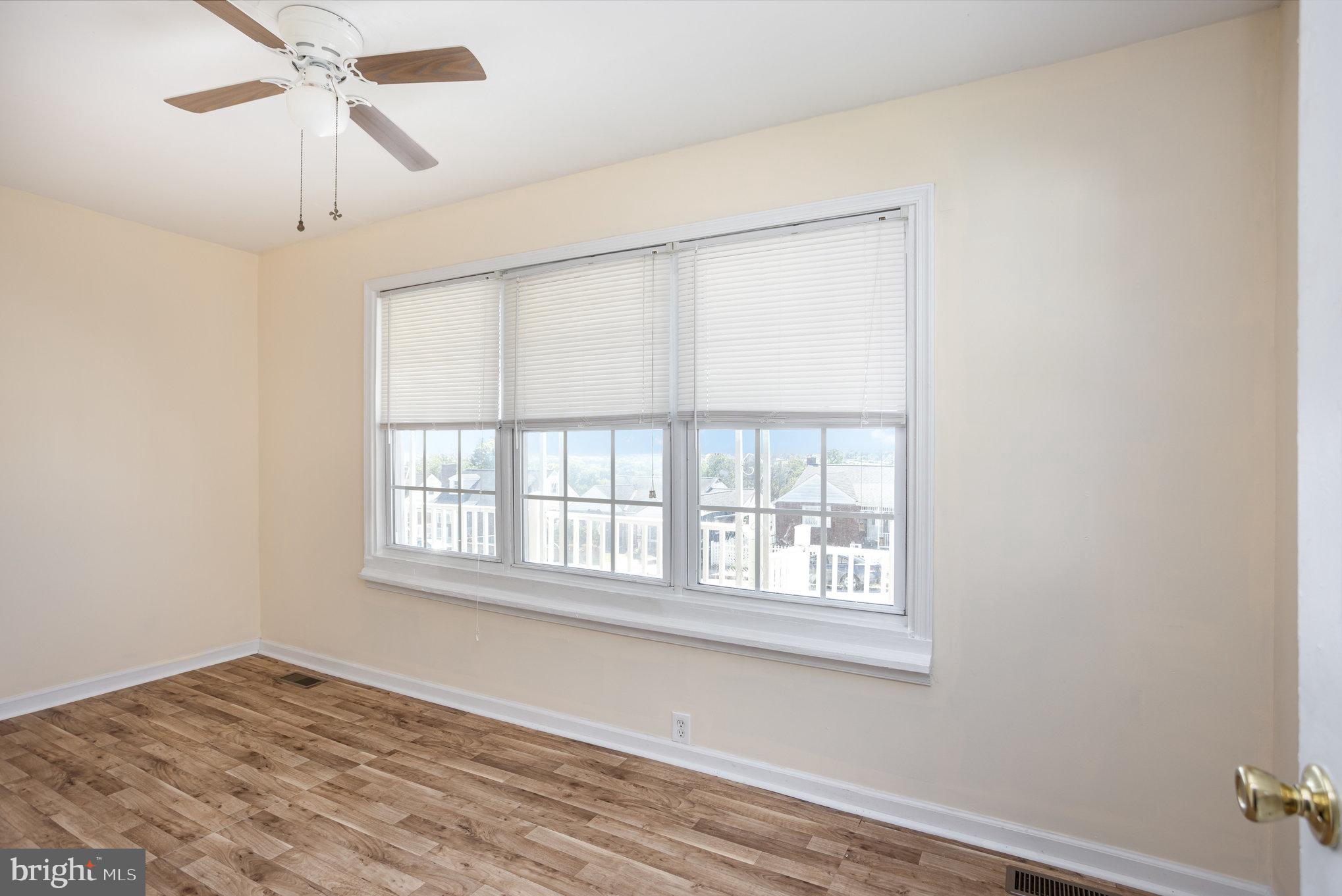 505 47th Street Baltimore, MD 21224 - Photo 10 of 41 a view of an empty room with a window