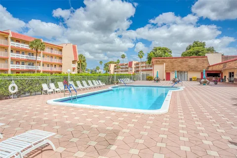 a view of a swimming pool and a buildings