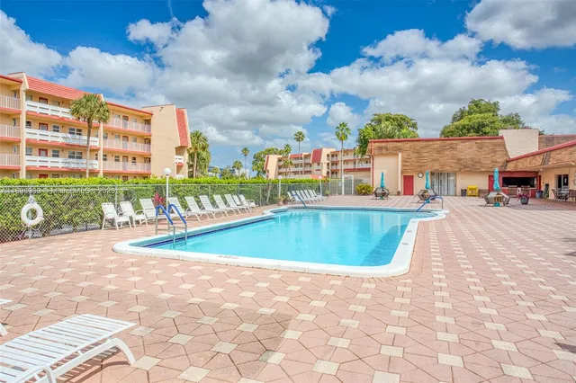 a view of a swimming pool and a buildings