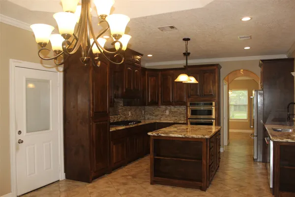 a view of a fireplace with wooden floor