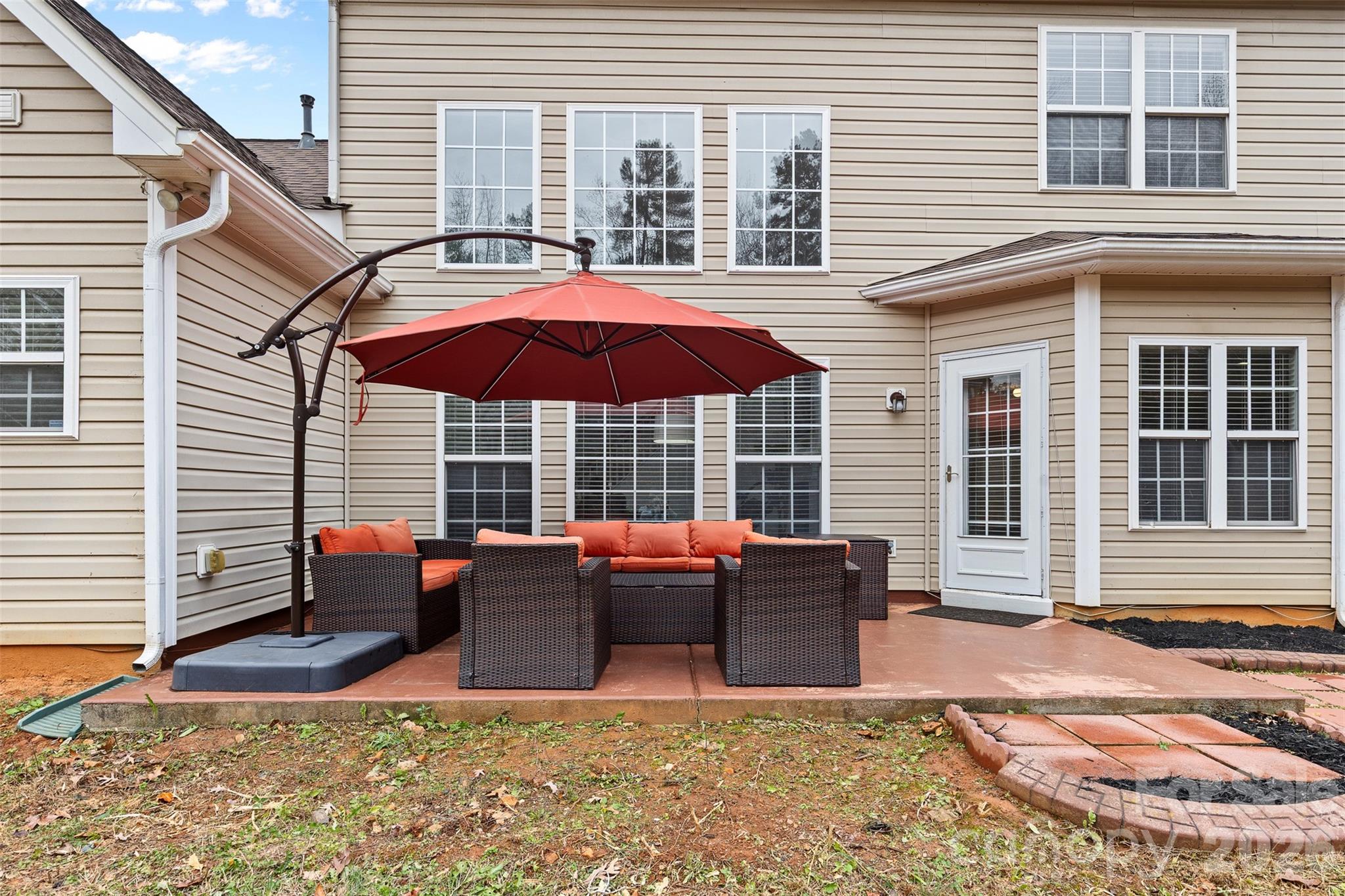 11919 Erwin Ridge Avenue Charlotte, NC 28213 - Photo 15 of 24 a backyard of a house with seating space