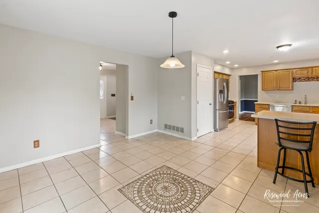 a view of kitchen with furniture and window