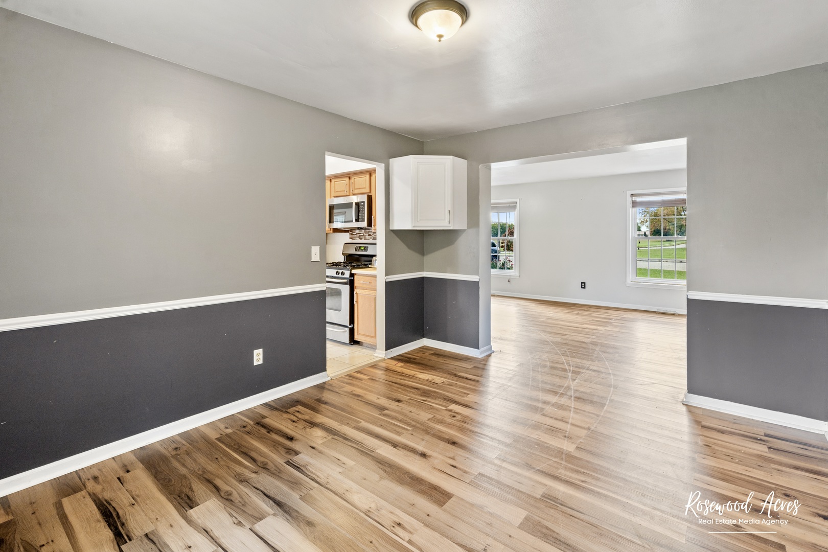 1403 West Budd Boulevard Kankakee, IL 60901 - Photo 20 of 46 a view of kitchen and empty room with wooden floor