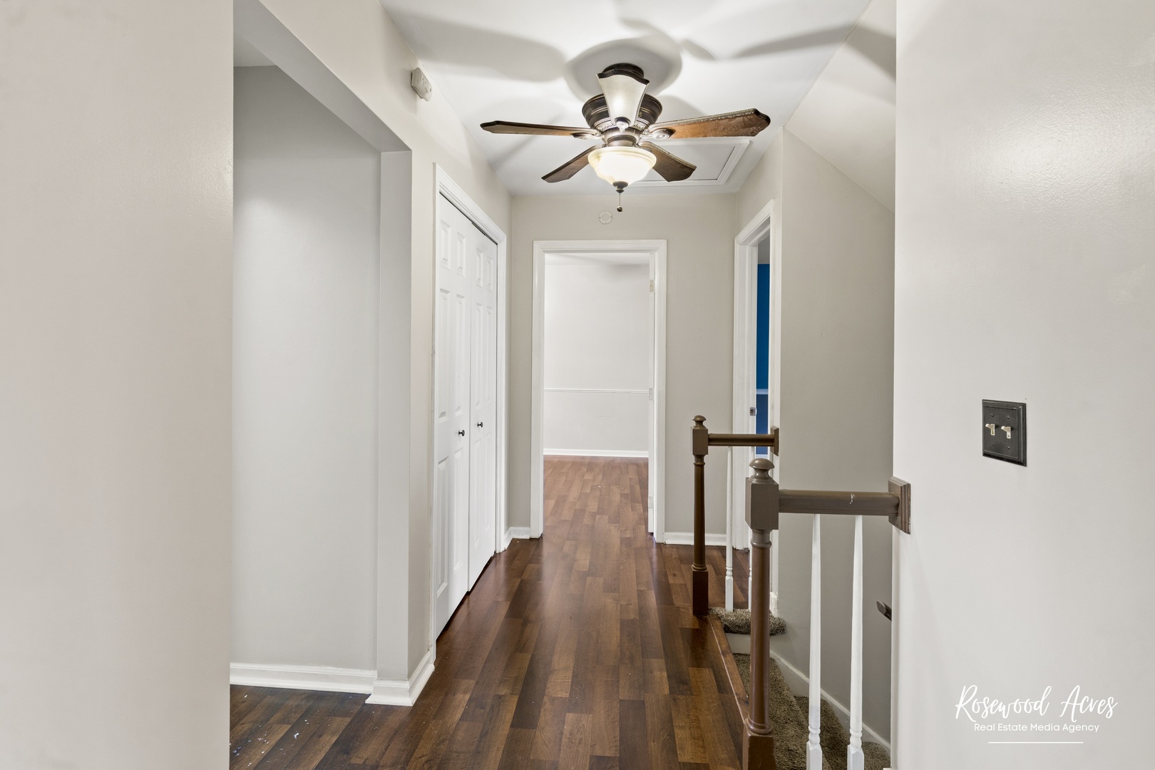 1403 West Budd Boulevard Kankakee, IL 60901 - Photo 23 of 46 a view of a hallway with a chandelier fan