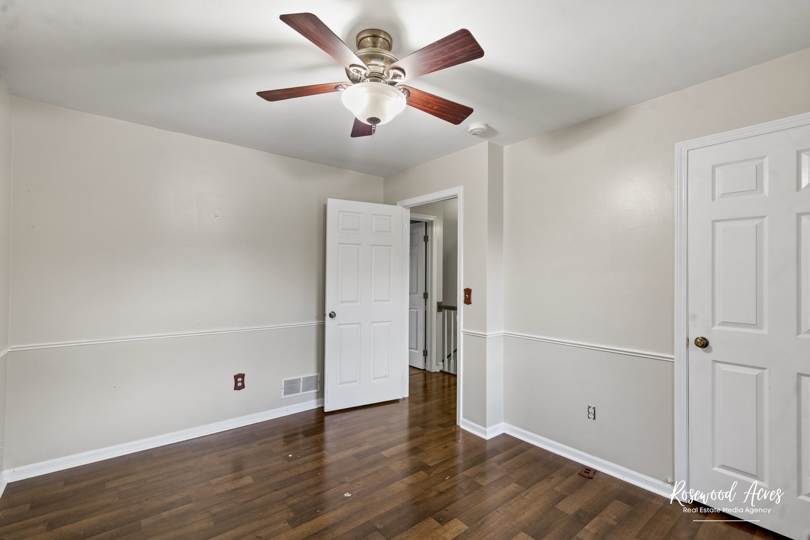 1403 West Budd Boulevard Kankakee, IL 60901 - Photo 26 of 46 wooden floor in an empty room