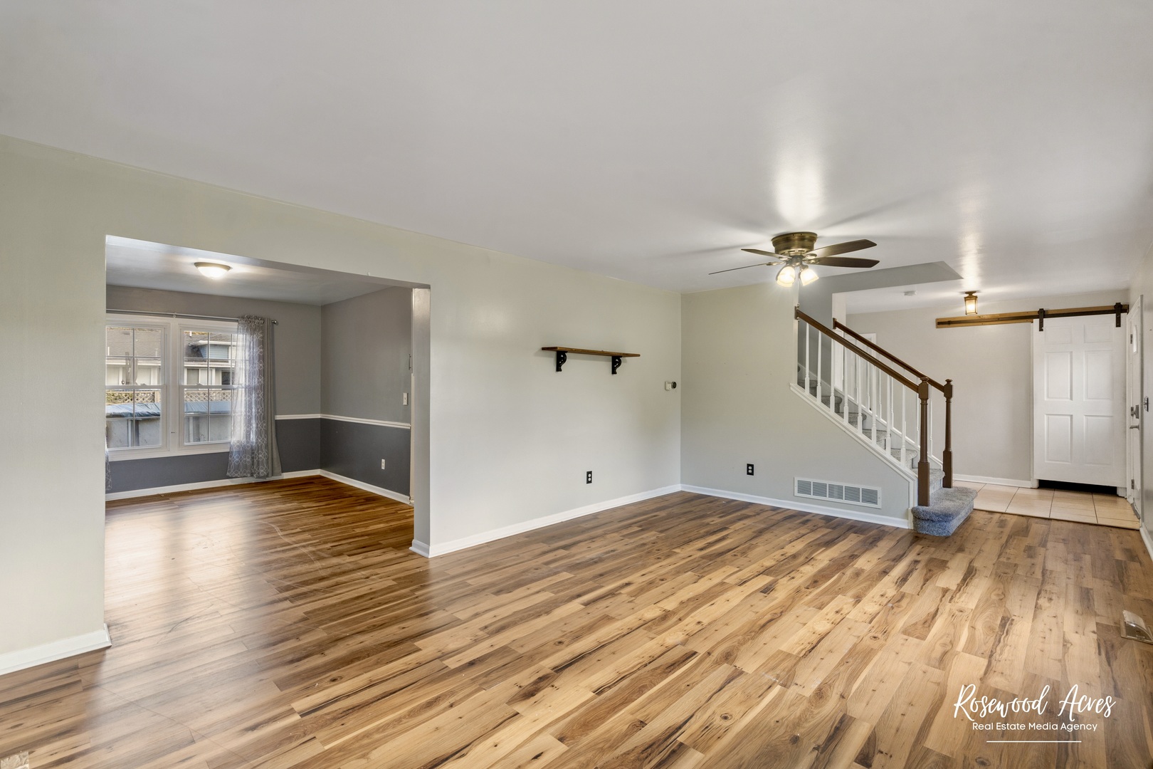 1403 West Budd Boulevard Kankakee, IL 60901 - Photo 5 of 46 a view of an empty room with wooden floor