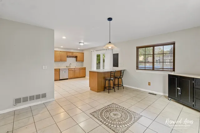 a view of kitchen with furniture and window