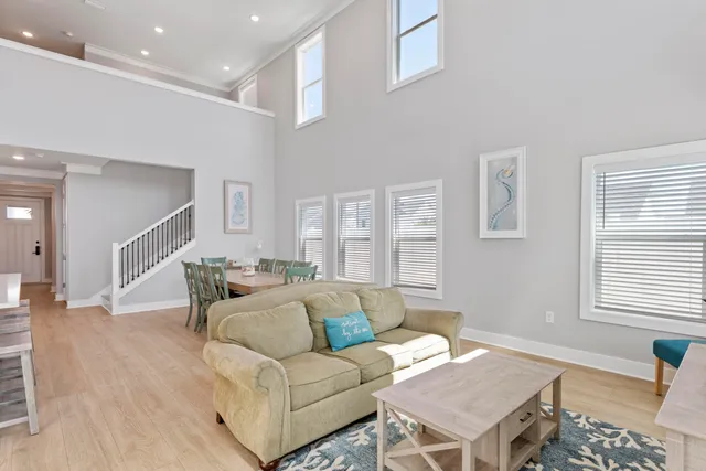 a living room with furniture and a table