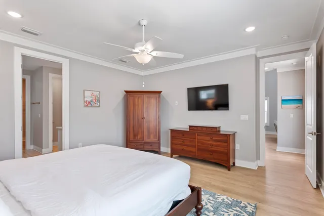 a en suite bathroom with a double vanity sink and a mirror