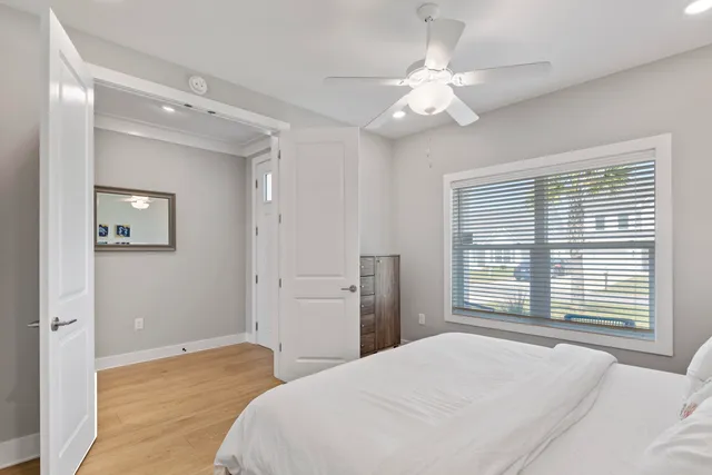 a bathroom with a sink toilet and a mirror