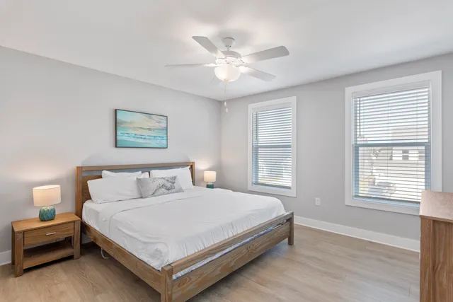 a view of backyard with seating area and green space