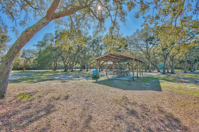 a view of a fountain in front of the house