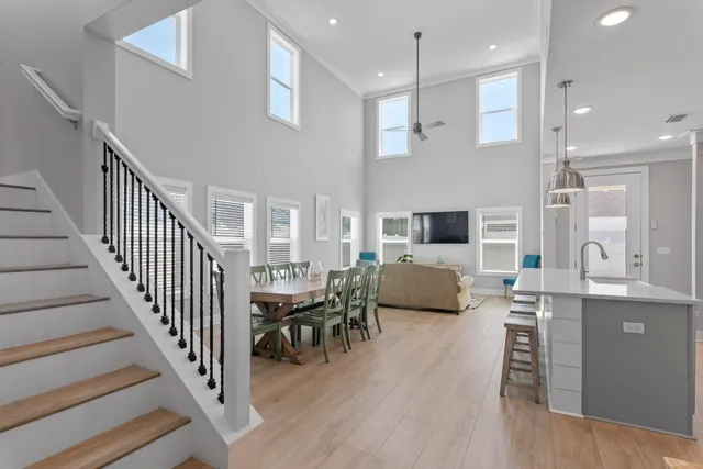 a view of a kitchen and dining room