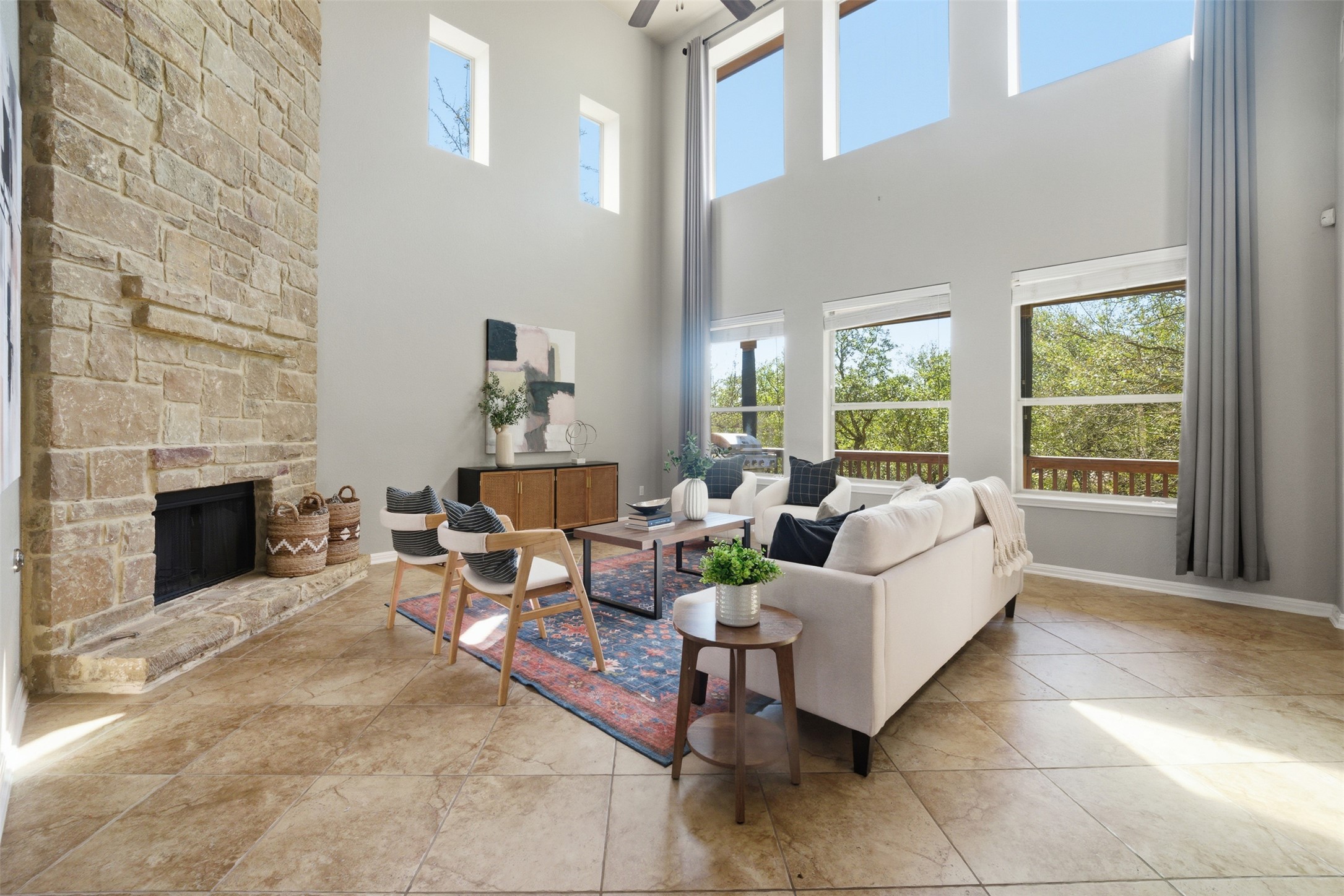 16100 Spillman Ranch Loop Austin, TX 78738 - Photo 10 of 39 a living room with furniture and a fireplace