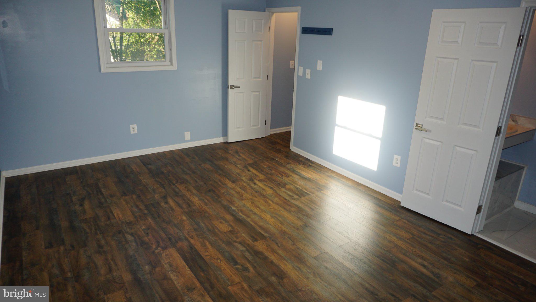 5854 Deale Churchton Road Deale, MD 20751 - Photo 49 of 57 Bright, airy room with modern flooring.