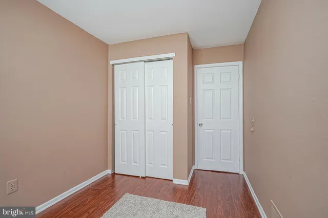 a view of room with hardwood floor