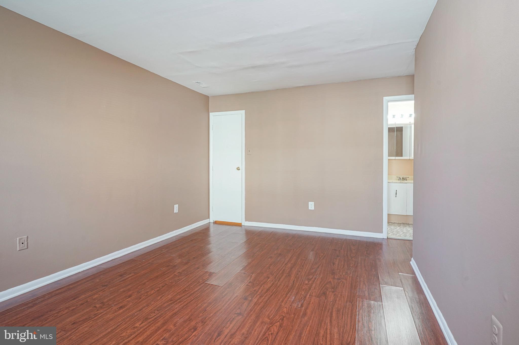 133 Willow Turn Mount Laurel, NJ 08054 - Photo 21 of 24 a view of an empty room with wooden floor and a window