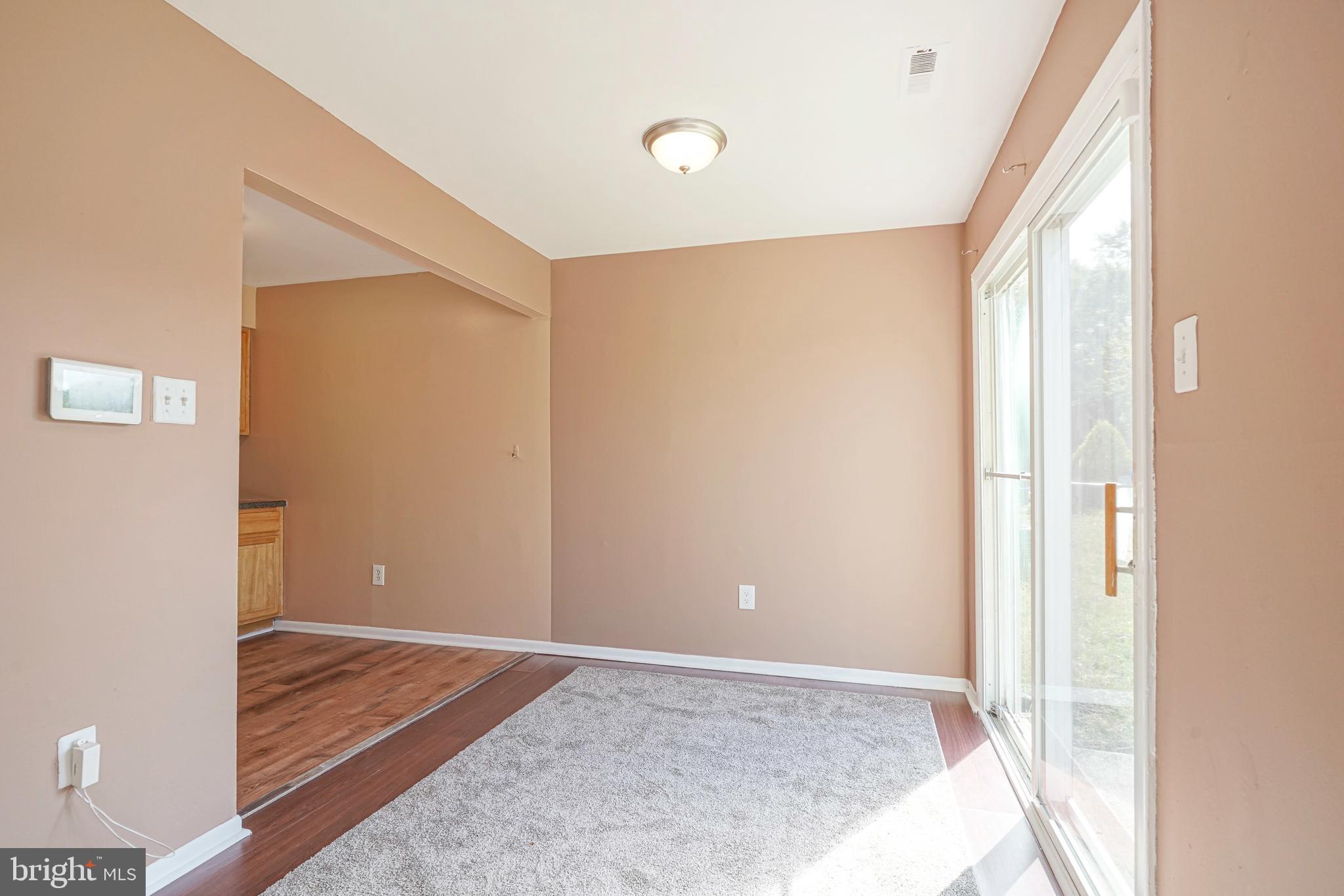 133 Willow Turn Mount Laurel, NJ 08054 - Photo 7 of 24 a view of room with window and wooden floor