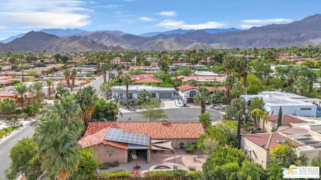 a view of a city with a mountain