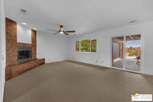 a view of a livingroom with a fireplace