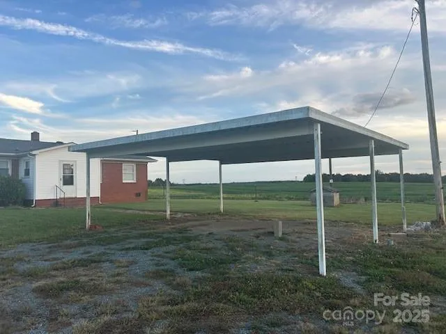 a house view with a garden space