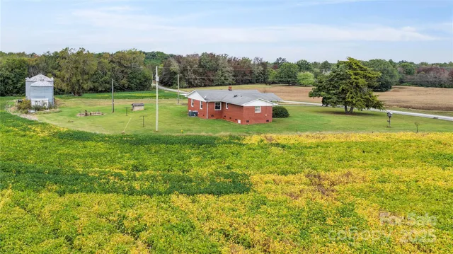a view of a garden with houses