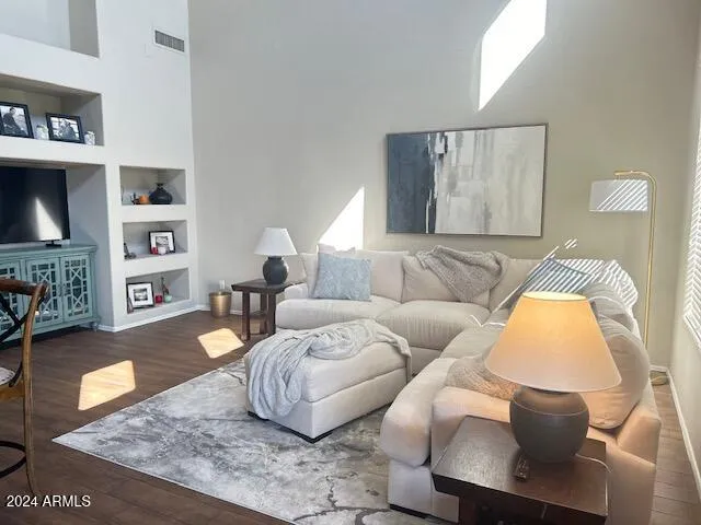 a living room with furniture and a couch