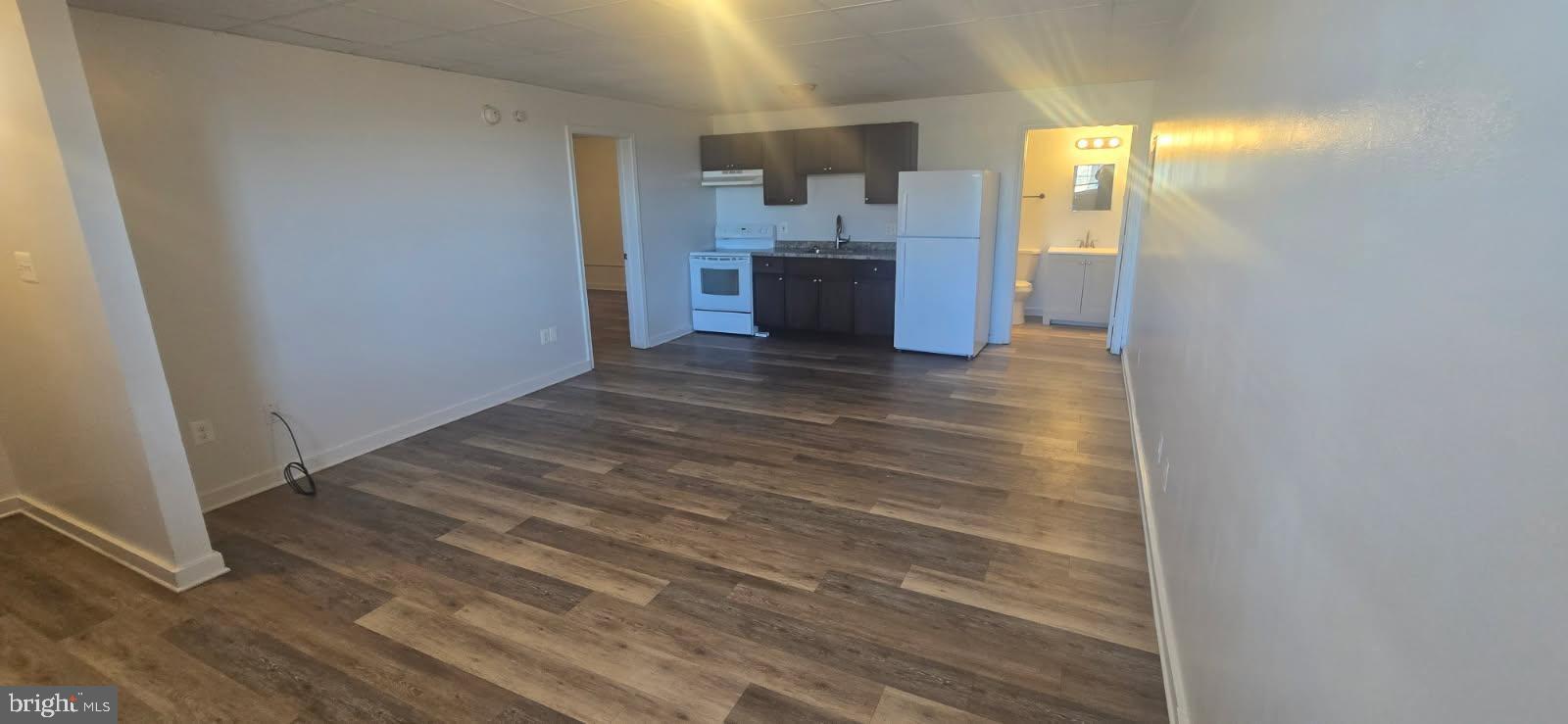 138 Harryhogan Road, Unit 13 Callao, VA 22435 - Photo 2 of 5 a view of a kitchen from the hallway