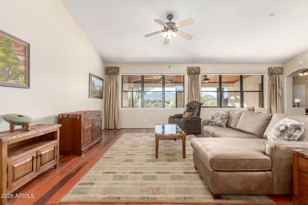 a living room with furniture and a window