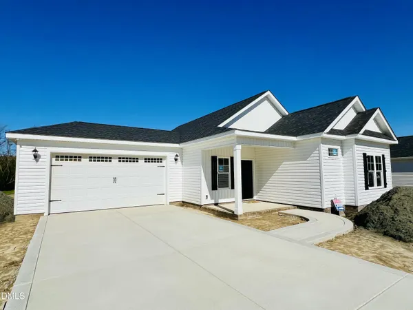 a view of a house with garage