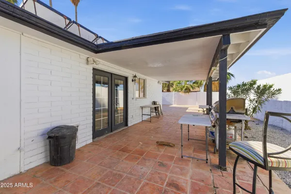 a bedroom with a bed and a walk in closet