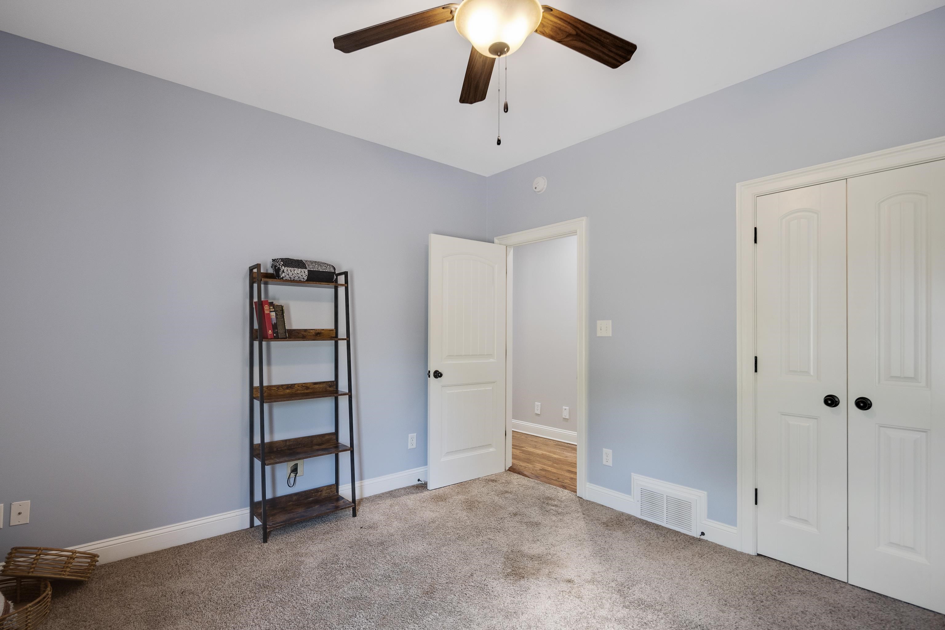 9028 Osborntown Road Arlington, TN 38002 - Photo 28 of 40 an empty room with windows and closet