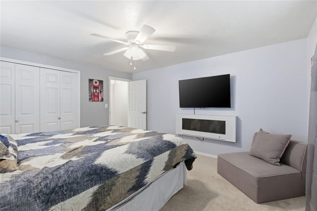 120 Crestview Manor Monongahela, PA 15063 - Photo 19 of 38 a spacious bedroom with a bed and a flat screen tv