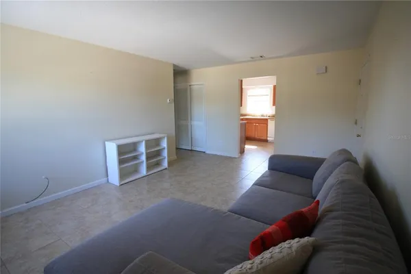 a living room with furniture and window