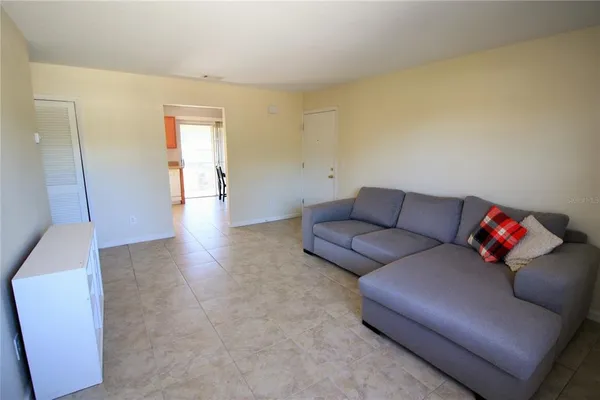 a living room with furniture and a couch