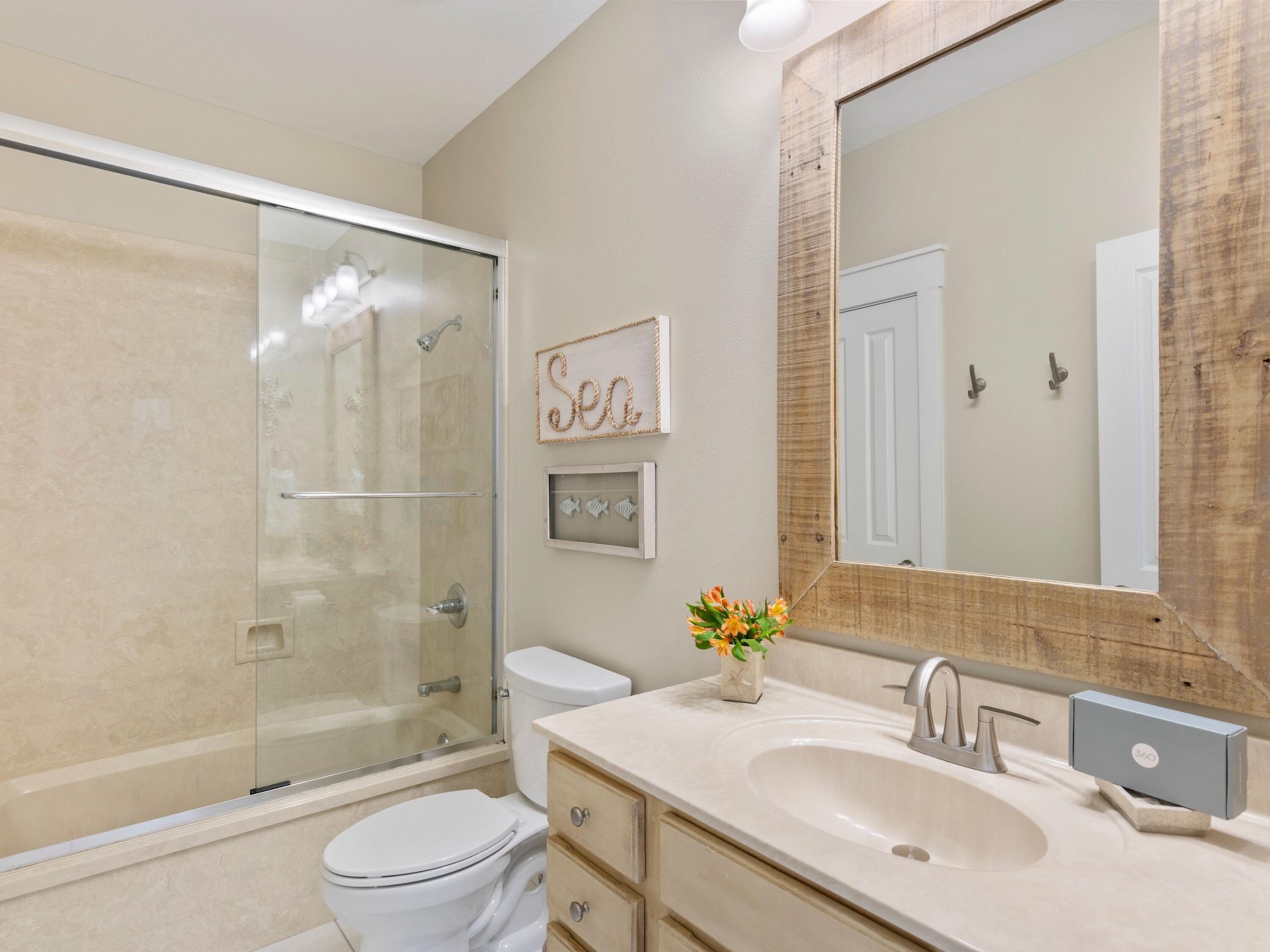 499 Lakeview Drive Santa Rosa Beach, FL 32459 - Photo 15 of 52 a bathroom with a sink toilet and shower