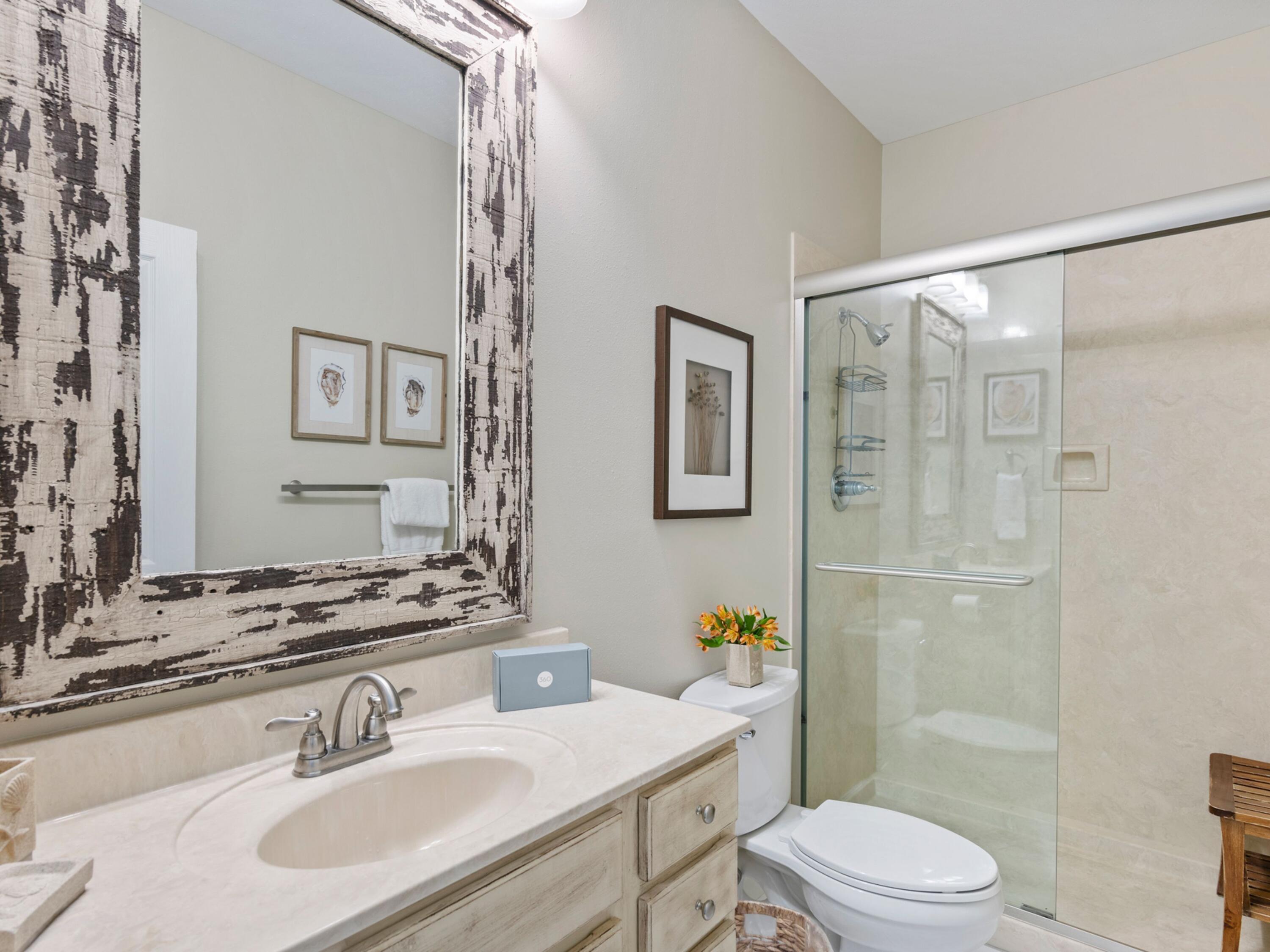 499 Lakeview Drive Santa Rosa Beach, FL 32459 - Photo 19 of 52 a bathroom with a sink toilet and shower