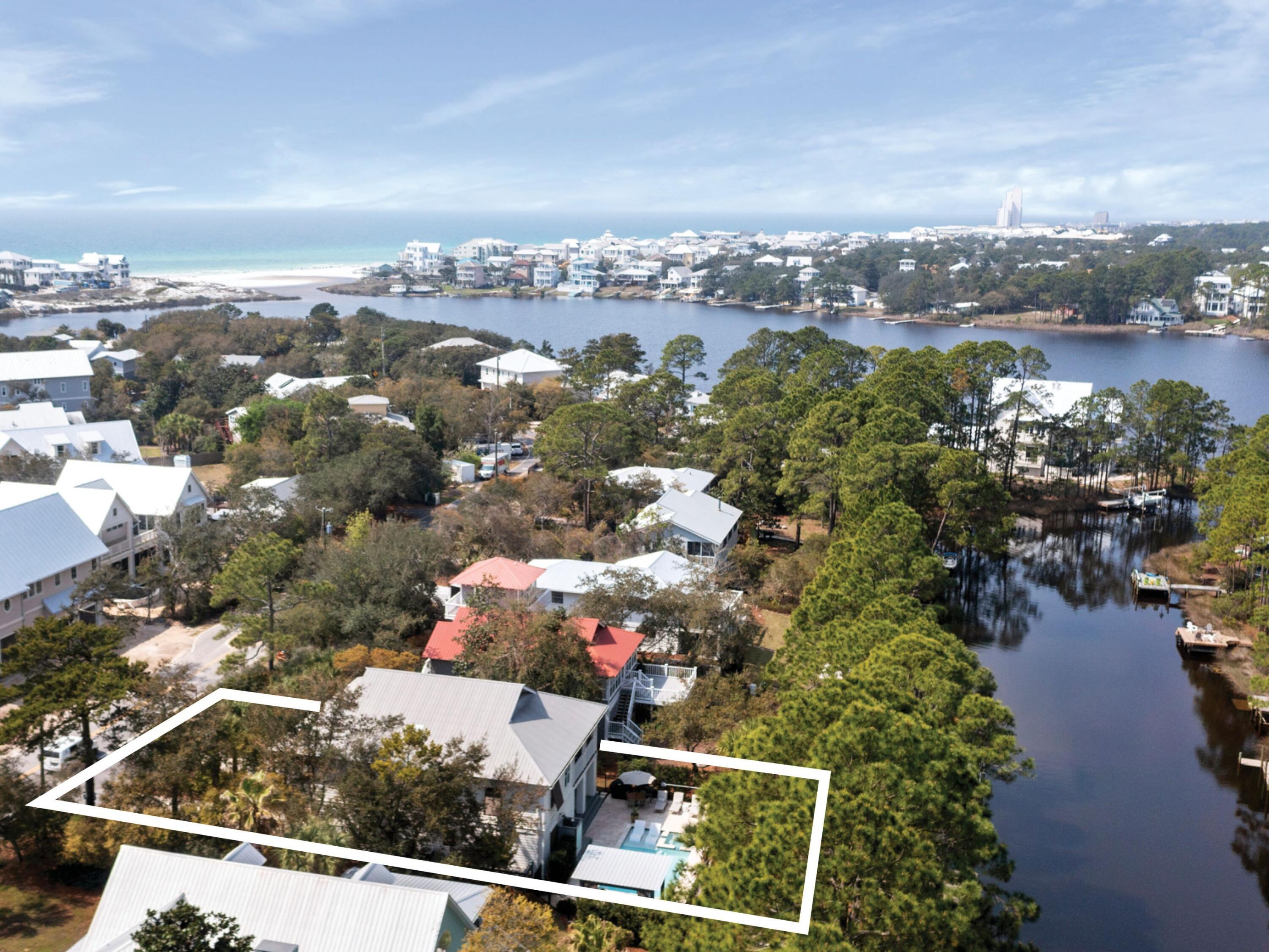 499 Lakeview Drive Santa Rosa Beach, FL 32459 - Photo 2 of 52 an aerial view of residential houses with outdoor space