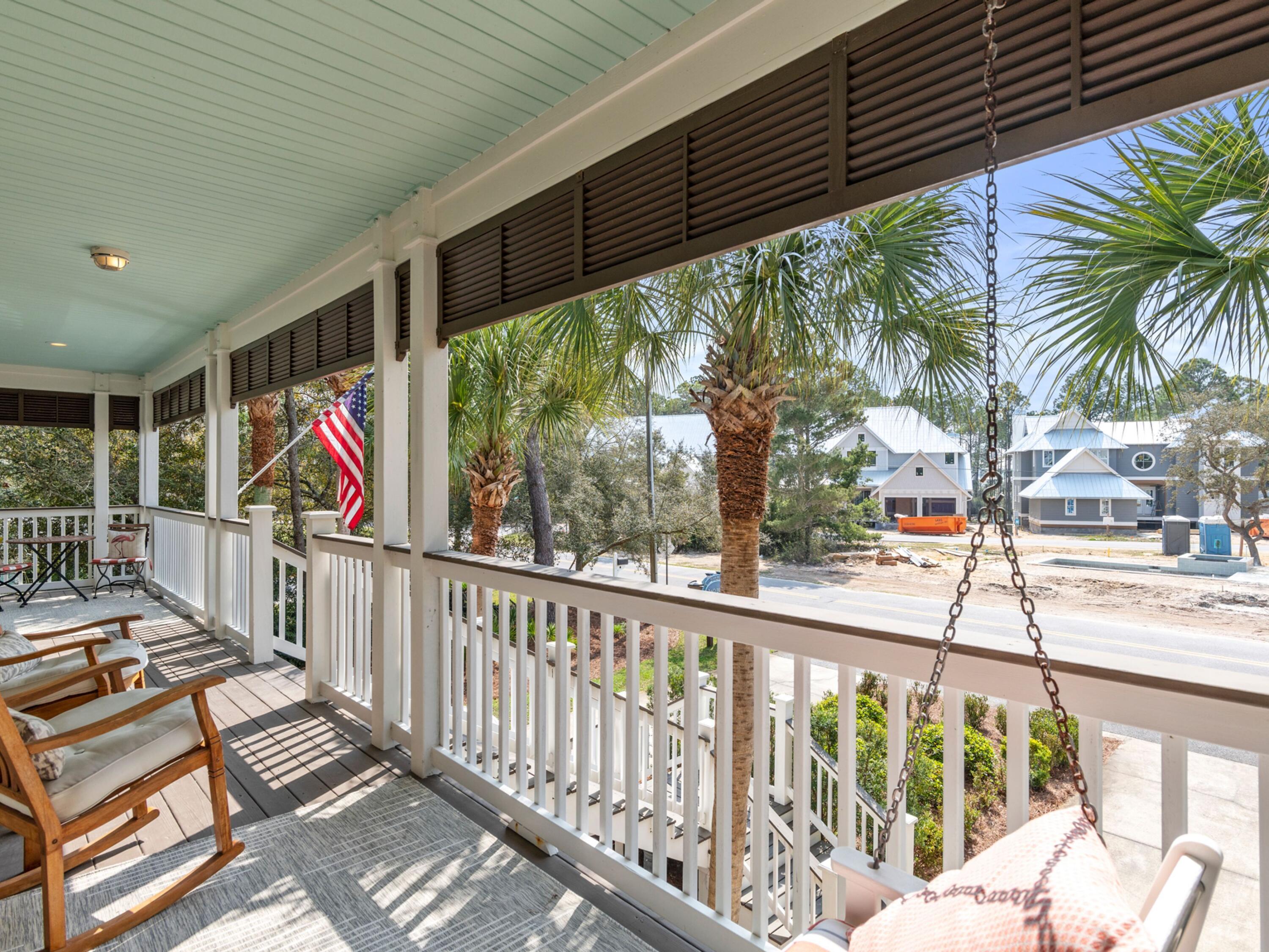 499 Lakeview Drive Santa Rosa Beach, FL 32459 - Photo 24 of 52 a view of a porch with wooden floor in front of city