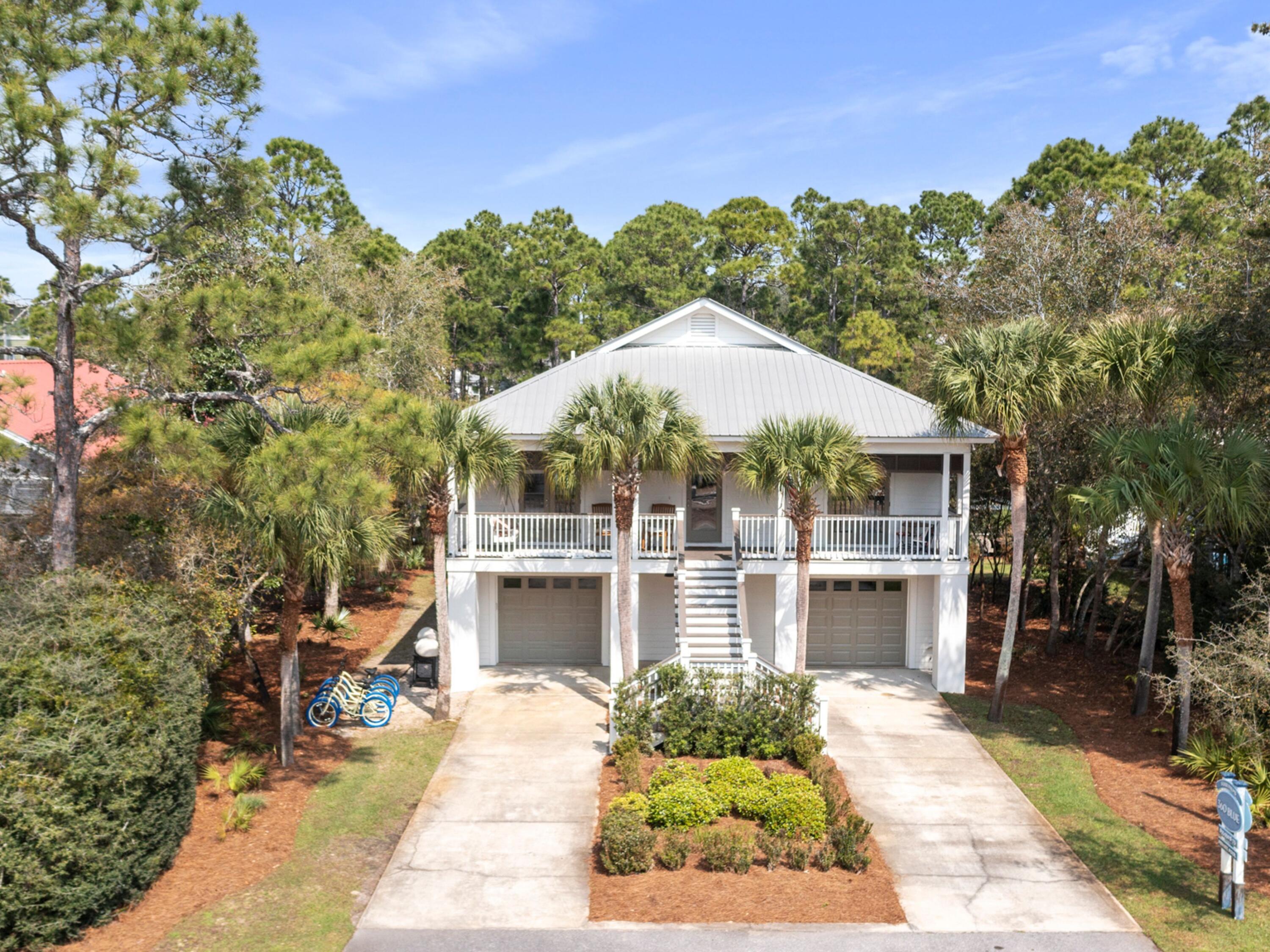 499 Lakeview Drive Santa Rosa Beach, FL 32459 - Photo 3 of 52 a front view of a house with a yard