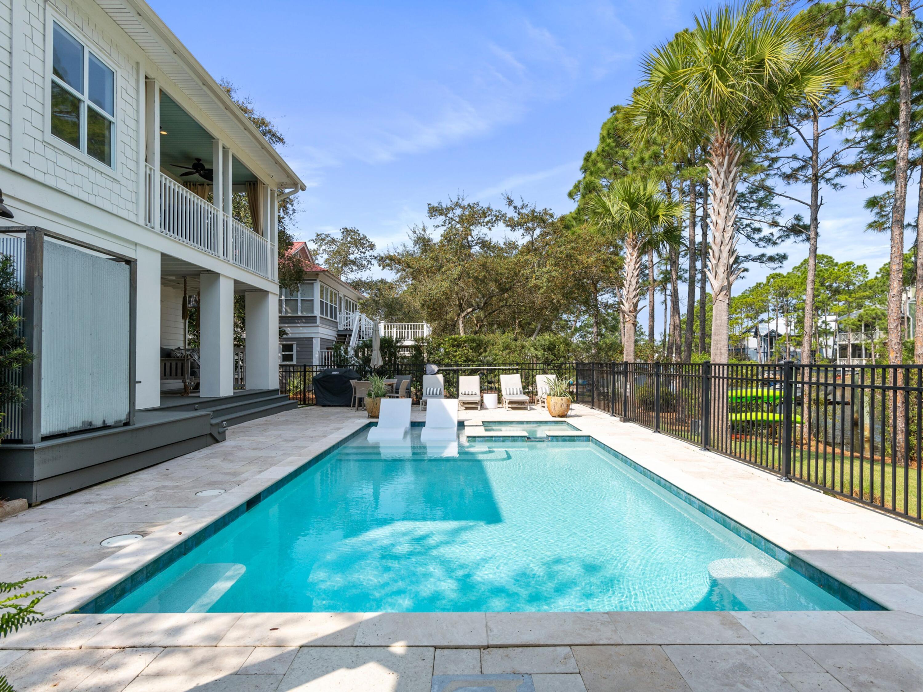 499 Lakeview Drive Santa Rosa Beach, FL 32459 - Photo 38 of 52 a view of house with swimming pool outdoor seating