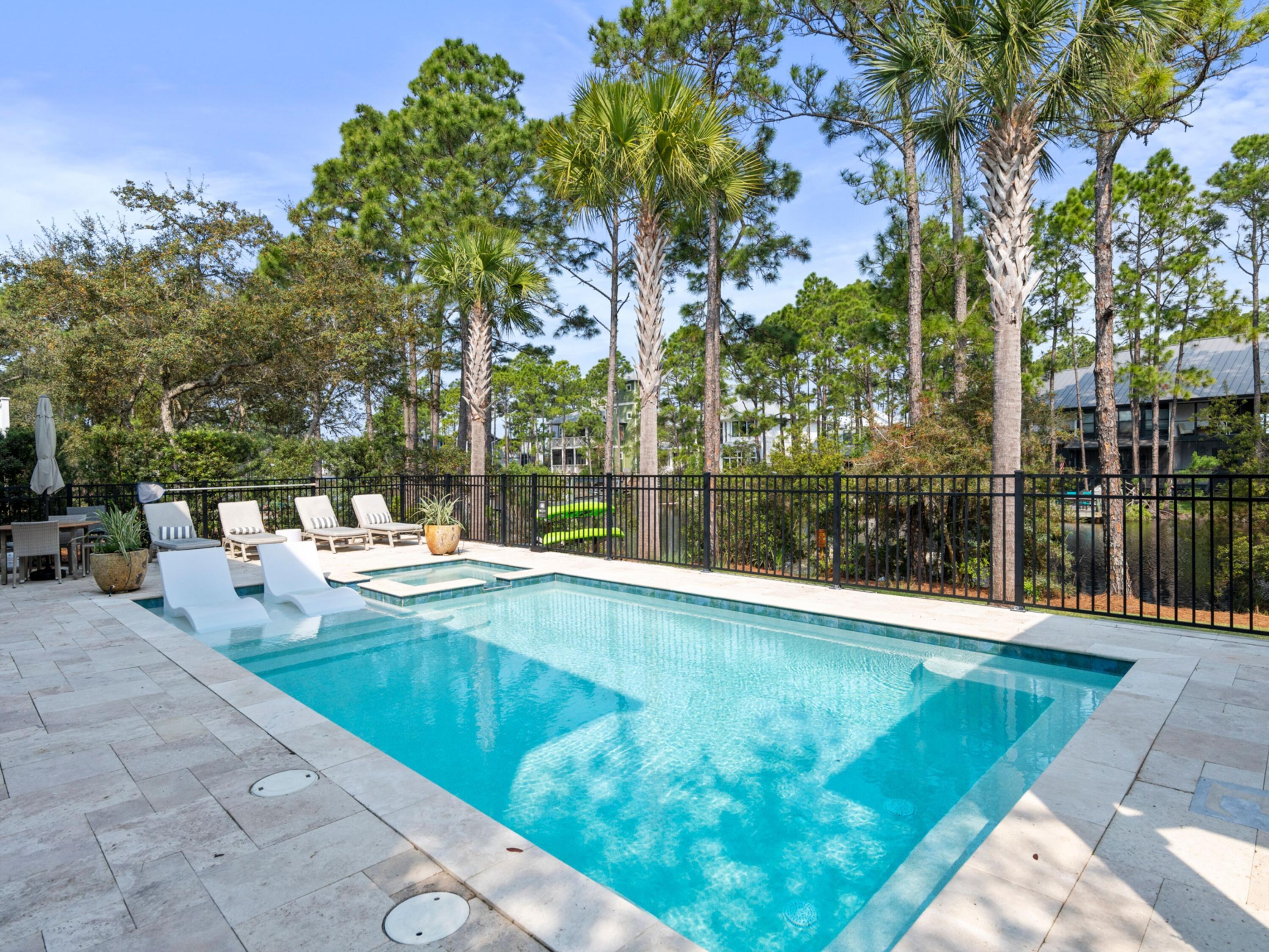 499 Lakeview Drive Santa Rosa Beach, FL 32459 - Photo 39 of 52 a view of a swimming pool with a patio